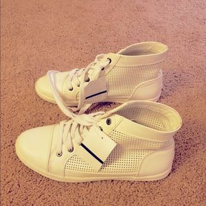 White leather Calvin Klein kicks